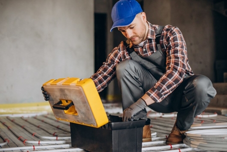 A picture of a technician getting tools